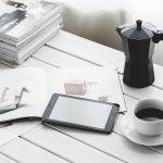 Technology, coffee cup, tablet — Budget-Friendly SMM Panels: A Smart Choice for Small Businesses