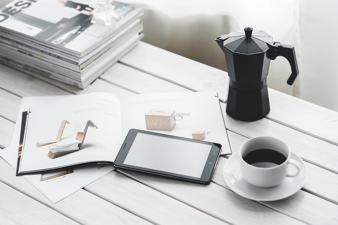 Technology, coffee cup, tablet — Budget-Friendly SMM Panels: A Smart Choice for Small Businesses